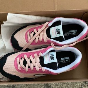 BRAND NEW! Never worn, still in box pair of New Balance sneakers